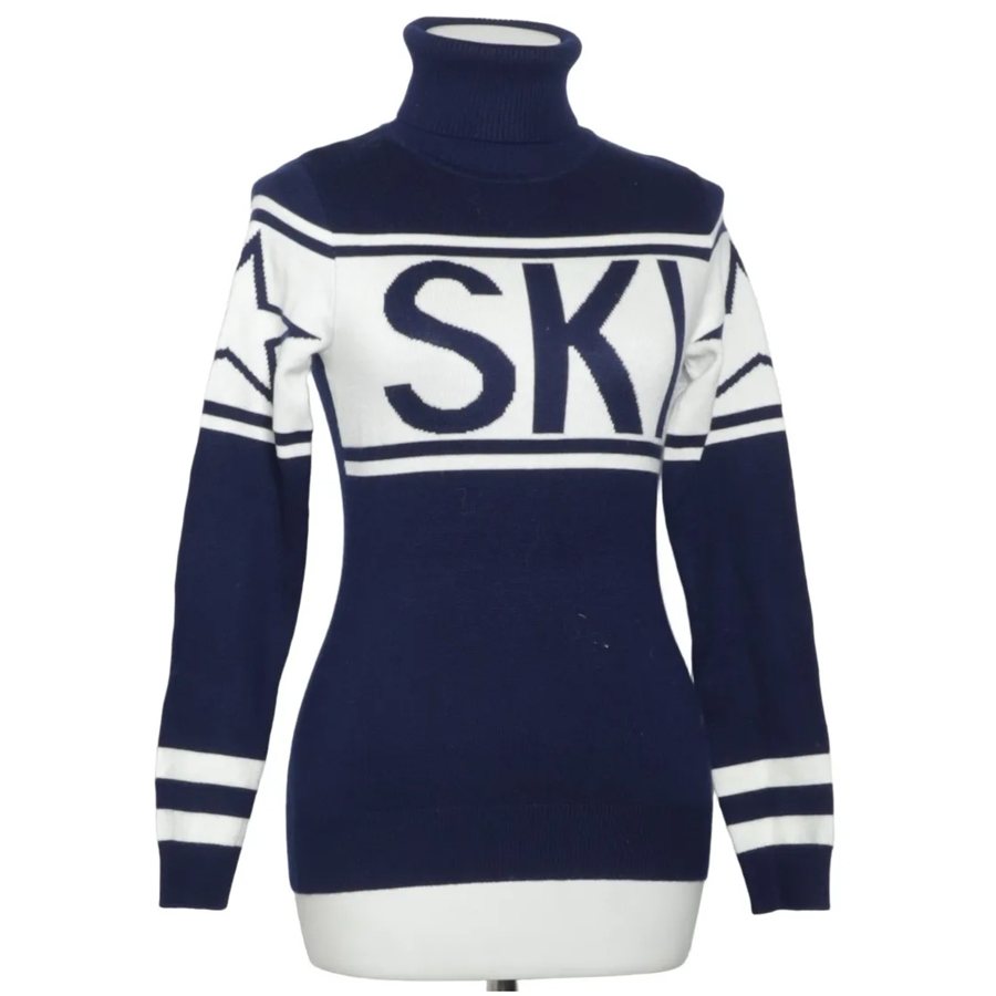 The store's photo of the Famme ski sweater on a dress form